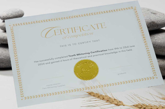 Teeth whitening Certification in Manitoba certificate flat lay with stones in background